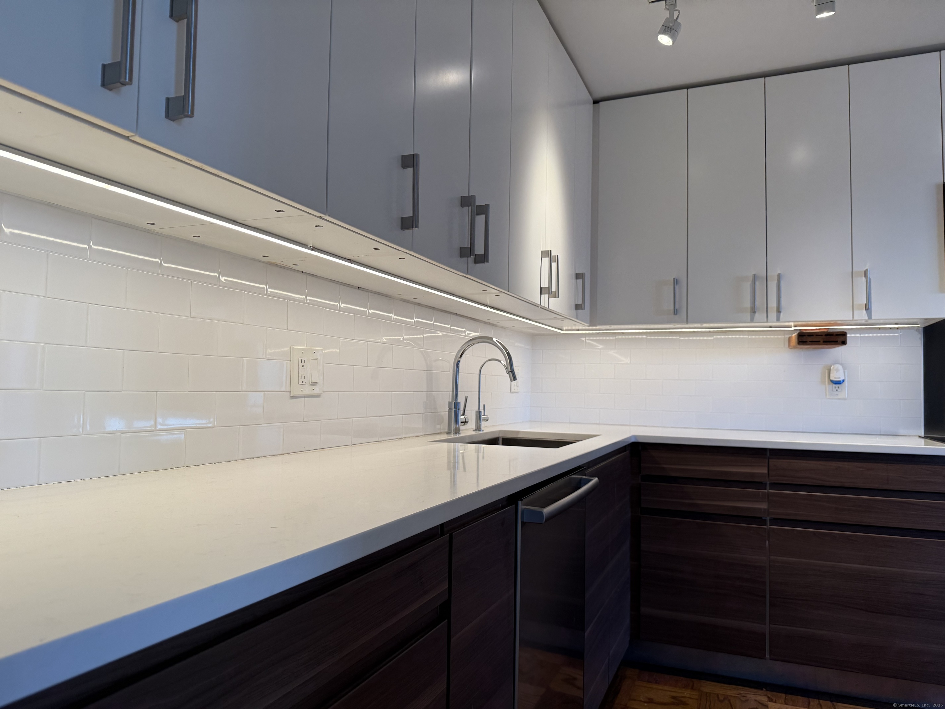 100 York Street, Unit 12S New Haven, CT 06511 - Photo 18 of 35 a kitchen with a sink and cabinets