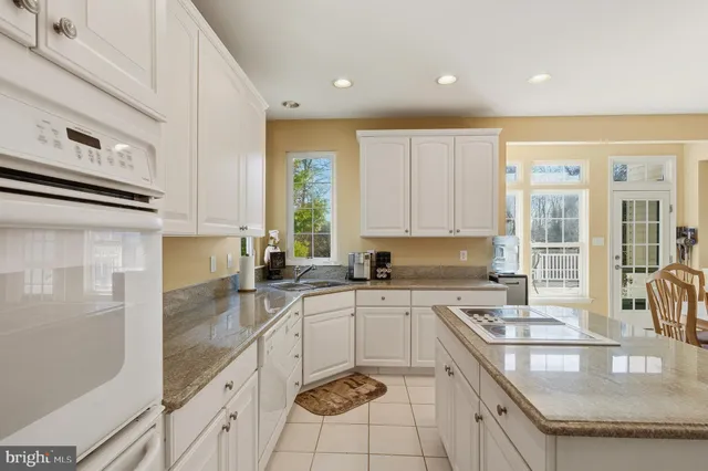 a workspace with furniture and a window