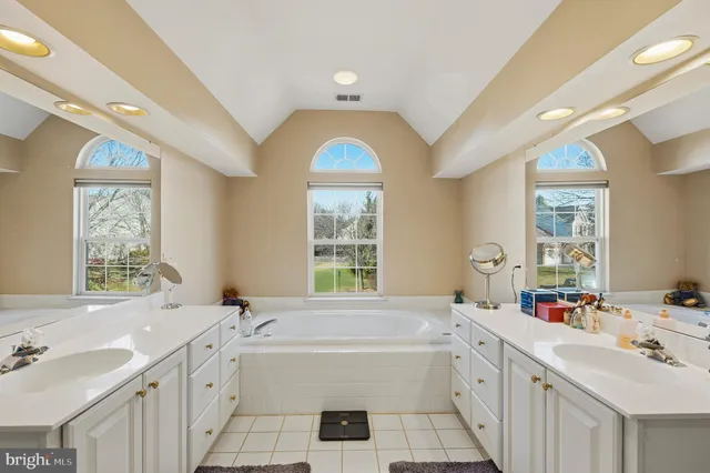 a bed room with a bed and a book shelf
