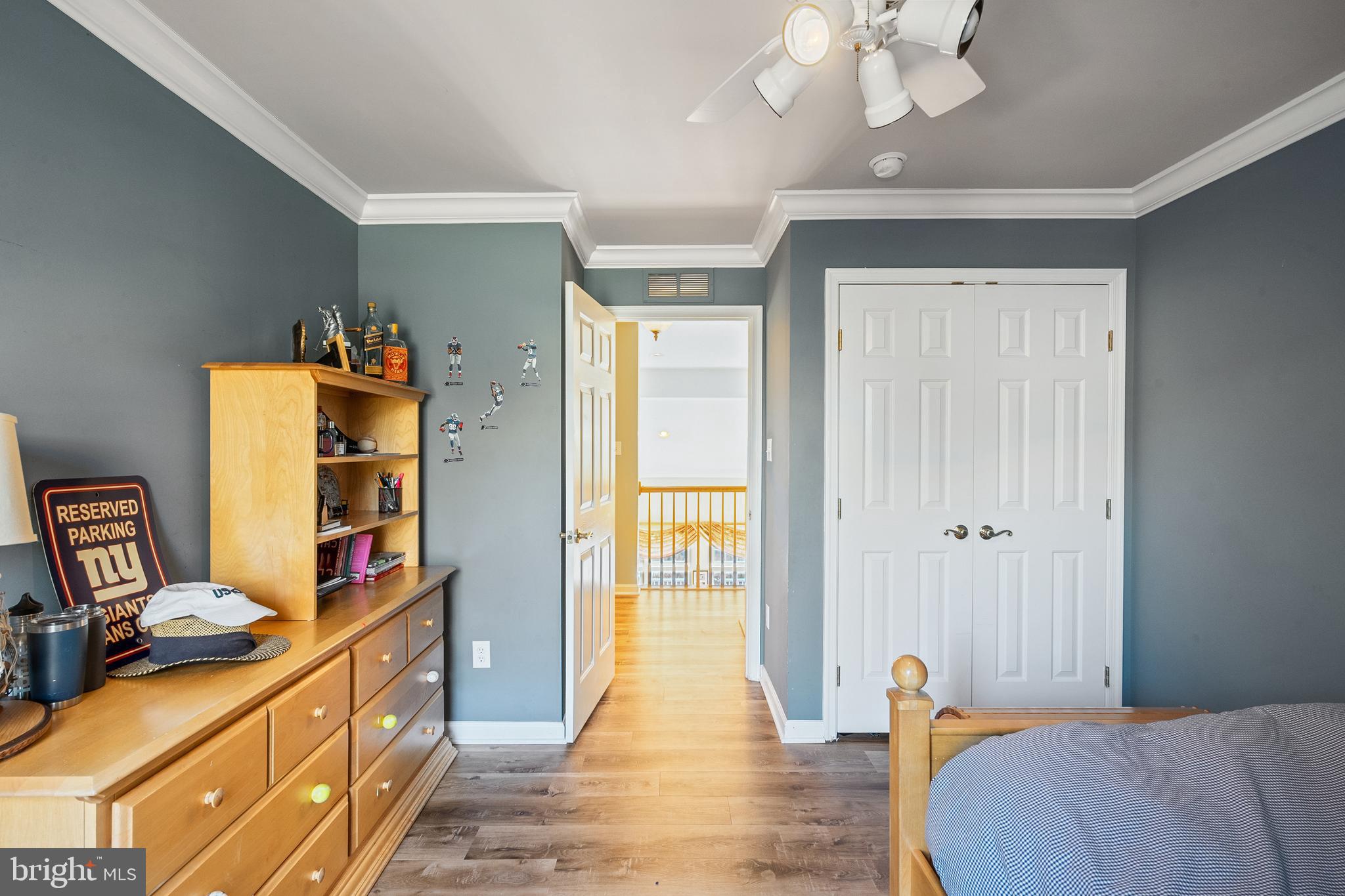 27 Donovan Road Pennington, NJ 08534 - Photo 36 of 60 a bed room with a bed and a book shelf