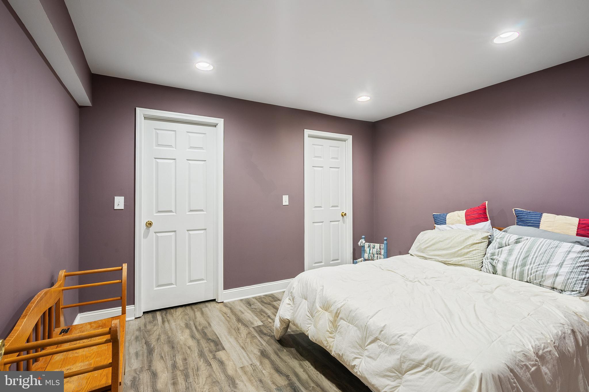 27 Donovan Road Pennington, NJ 08534 - Photo 44 of 60 a bedroom with a bed and a refrigerator