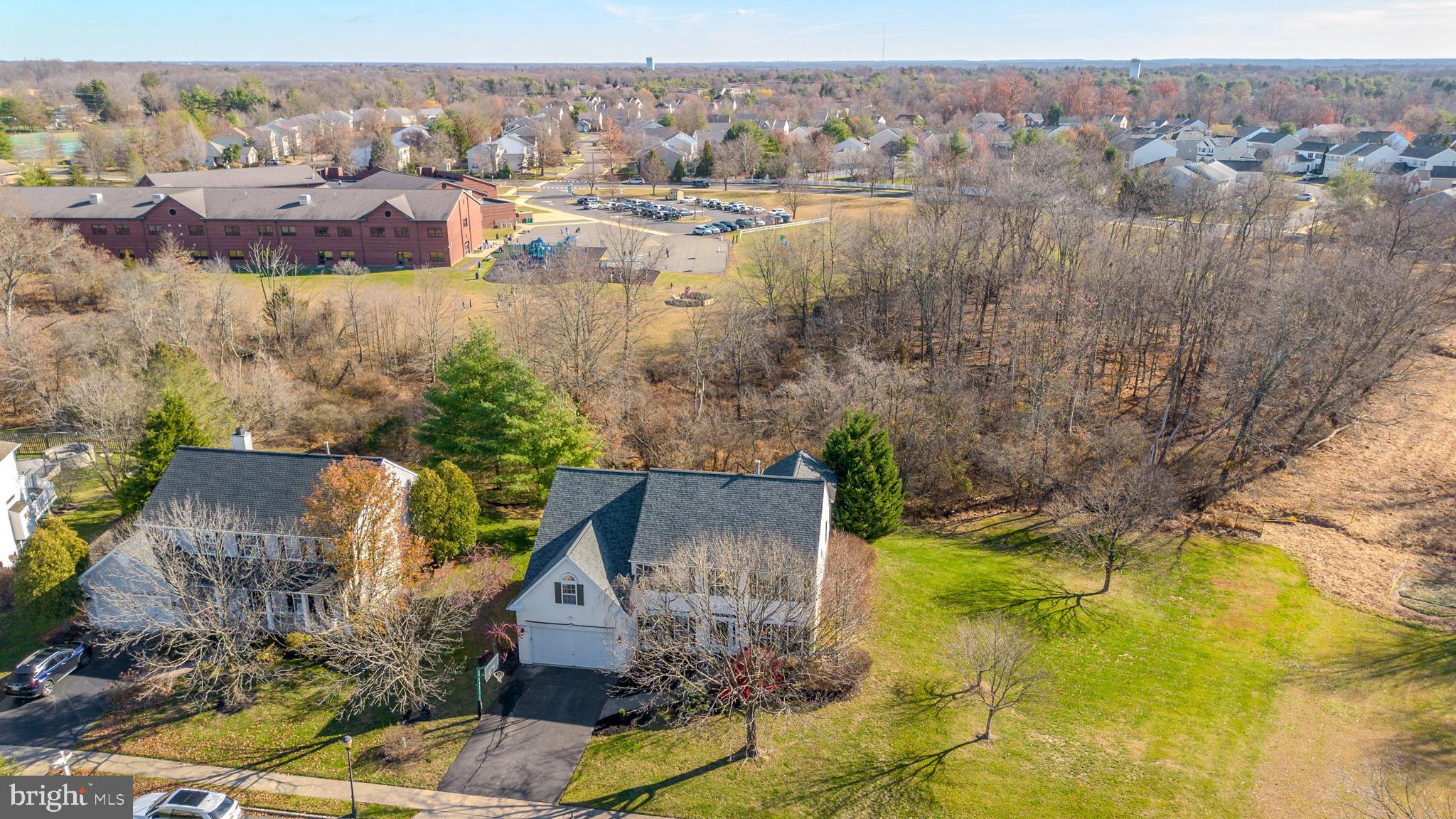 27 Donovan Road Pennington, NJ 08534 - Photo 50 of 60 an aerial view of residential houses with outdoor space and swimming pool