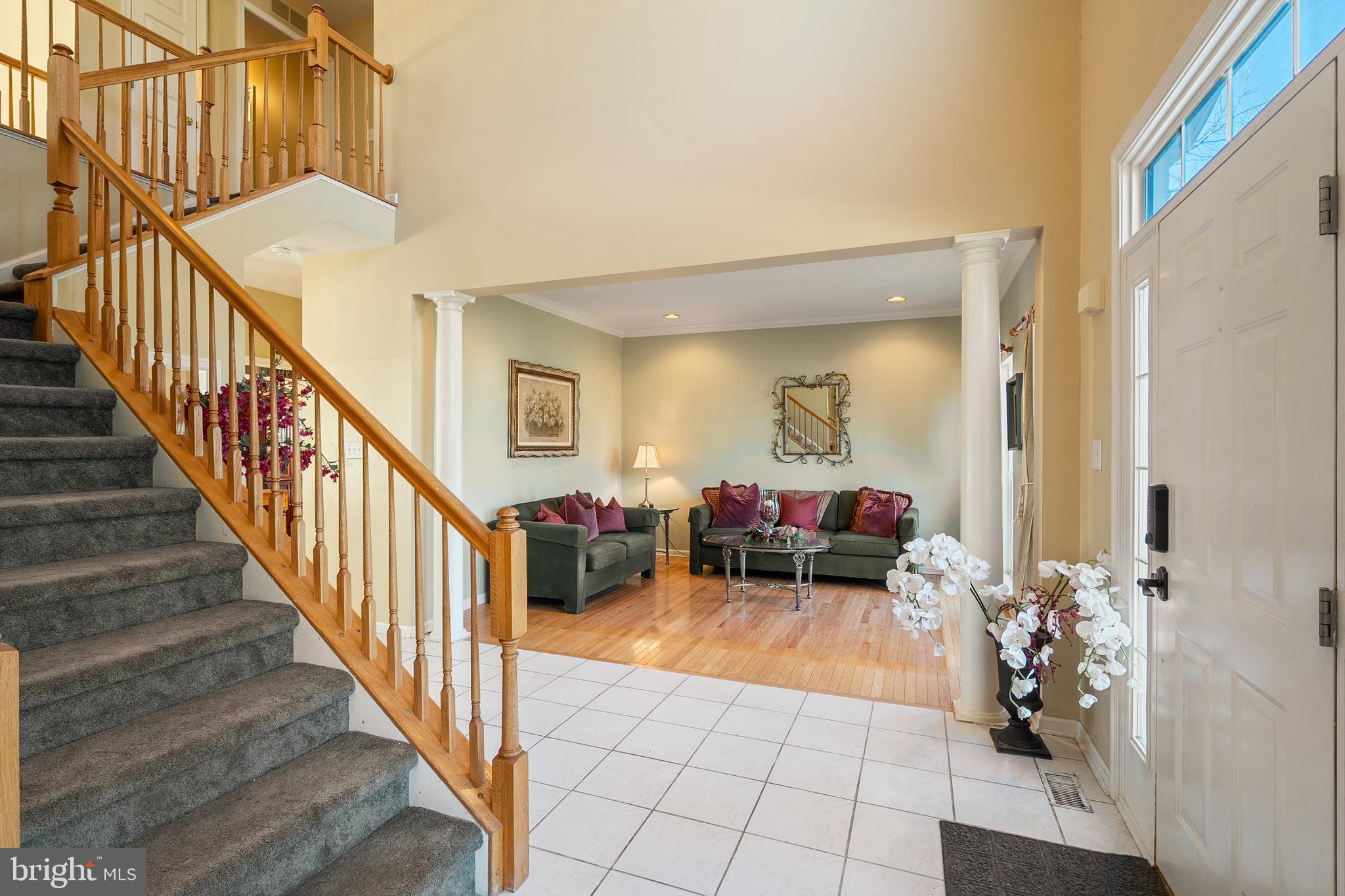 27 Donovan Road Pennington, NJ 08534 - Photo 7 of 60 a view of a livingroom with furniture and stairs