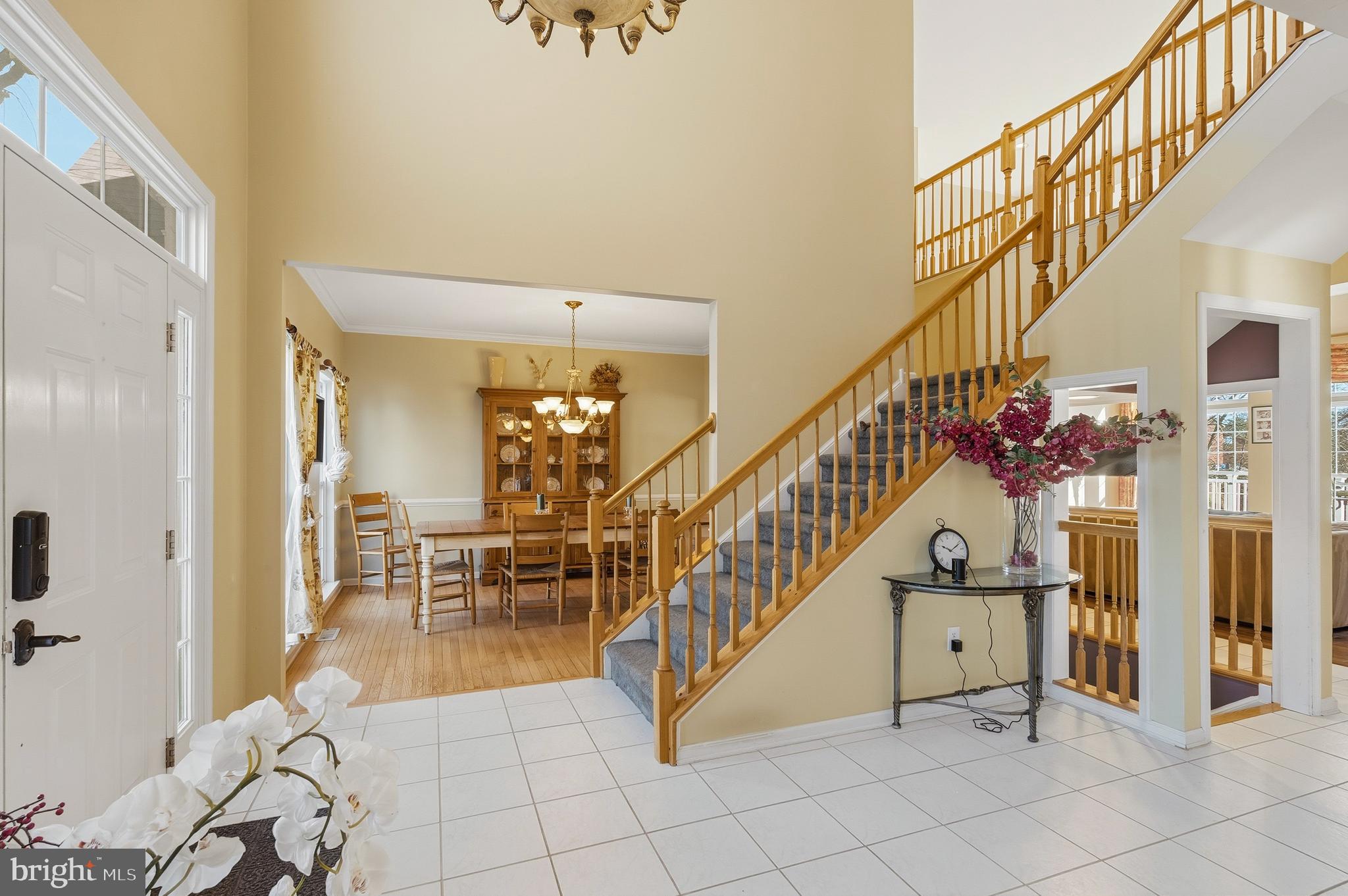 27 Donovan Road Pennington, NJ 08534 - Photo 10 of 60 a view of entryway and hall with dining room