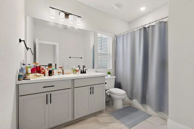 a workspace with furniture and a window