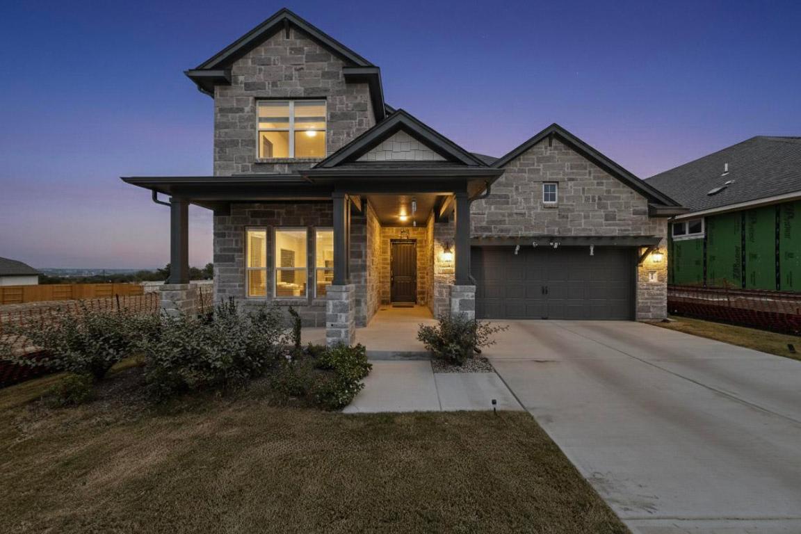 1304 Snowdrop Drive Georgetown, TX 78628 - Photo 2 of 27 a front view of a house with garden