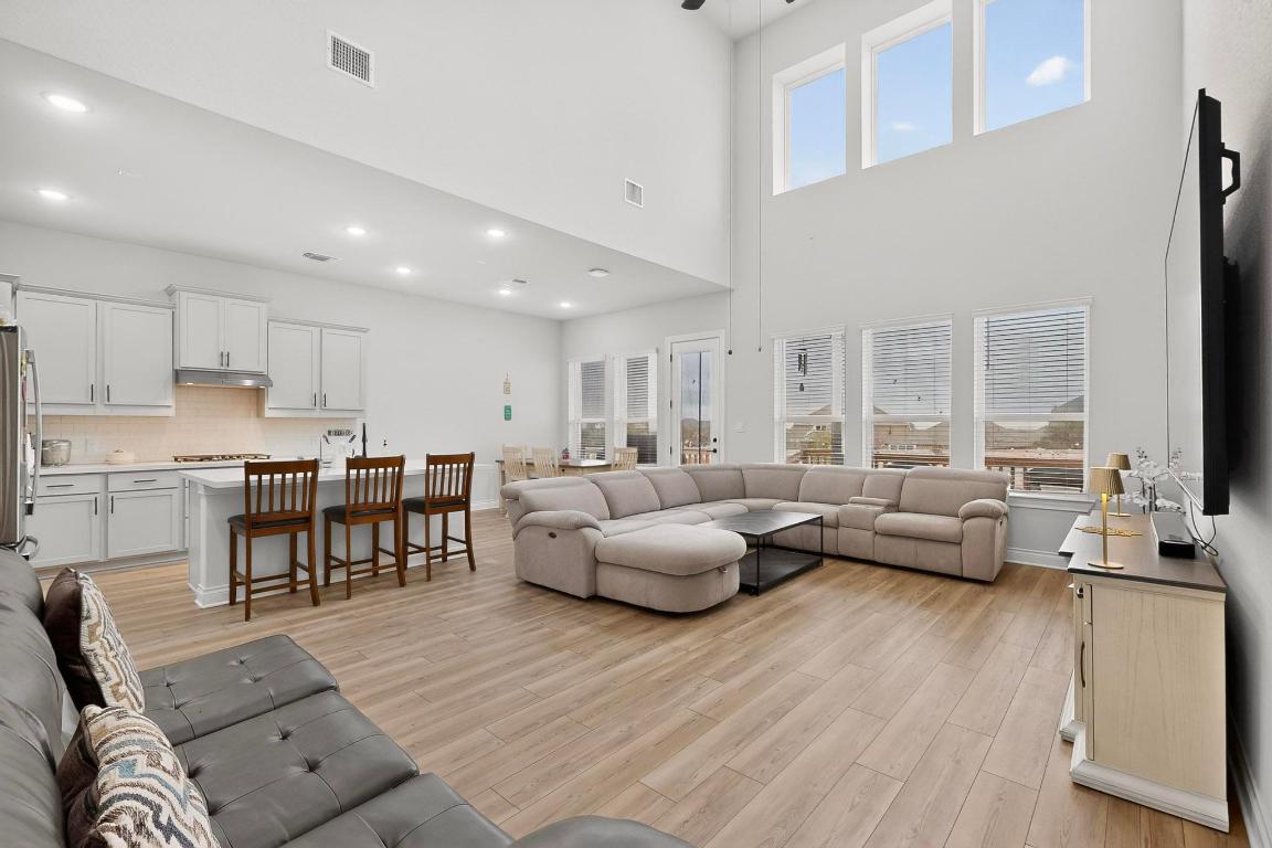 1304 Snowdrop Drive Georgetown, TX 78628 - Photo 6 of 27 a living room with furniture and a large window
