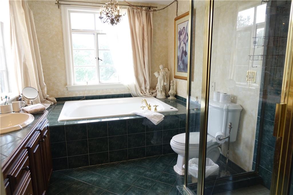 227 Meridian Road Butler, PA 16001 - Photo 17 of 25 Master bathroom with double bowl sinks, jet tub, and large ceramic shower