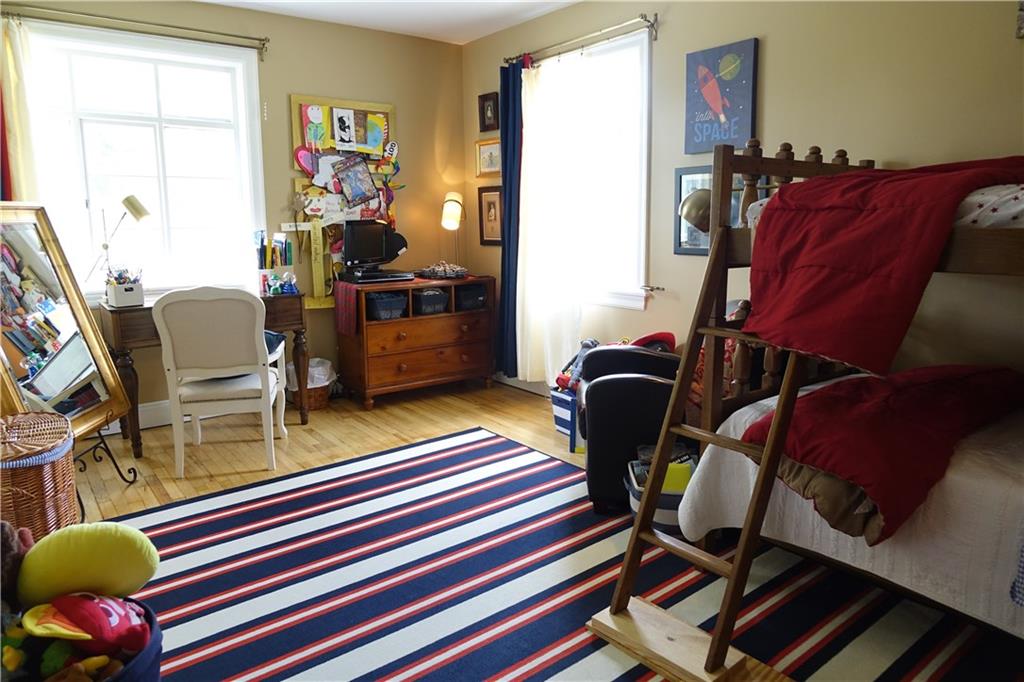 227 Meridian Road Butler, PA 16001 - Photo 19 of 25 Bedroom with hardwood flooring and abundant closet space