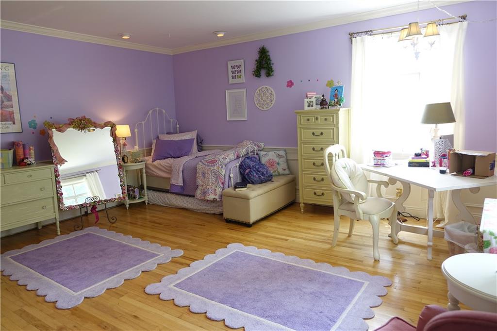 227 Meridian Road Butler, PA 16001 - Photo 20 of 25 Bedroom with hardwood flooring and abundant closet space