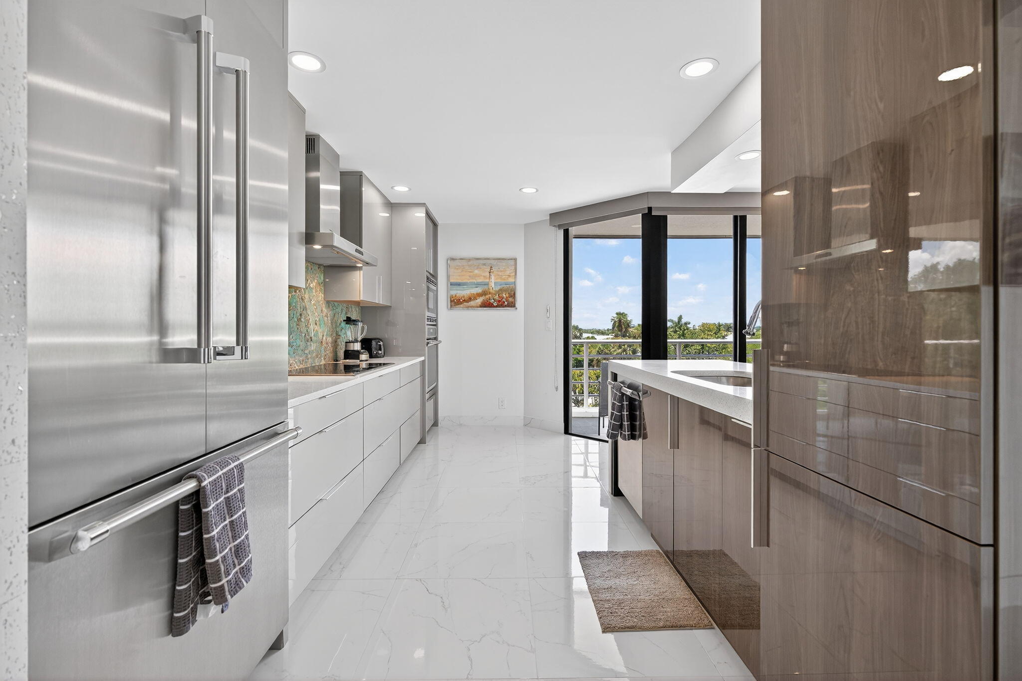 176 Helios Drive, Unit 210 Jupiter, FL 33477 - Photo 5 of 47 Gourmet Kitchen with Sunset Views