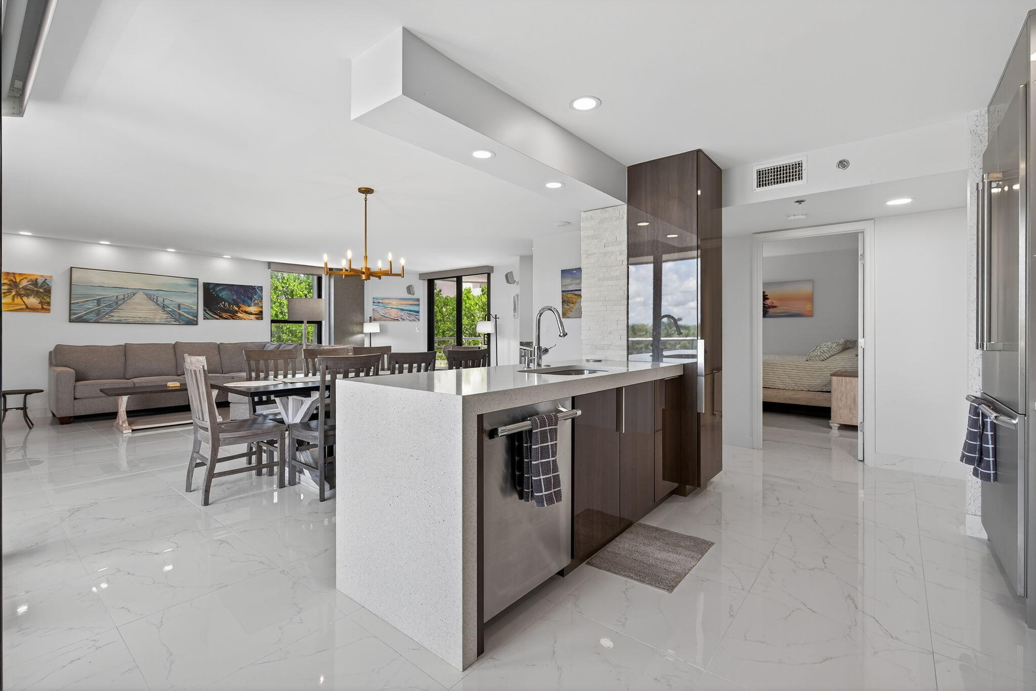 176 Helios Drive, Unit 210 Jupiter, FL 33477 - Photo 9 of 47 Marble Look Tile Throughout