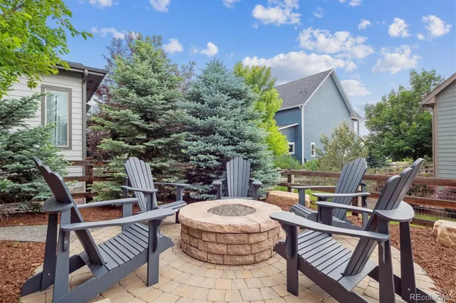 a view of outdoor sitting area with furniture