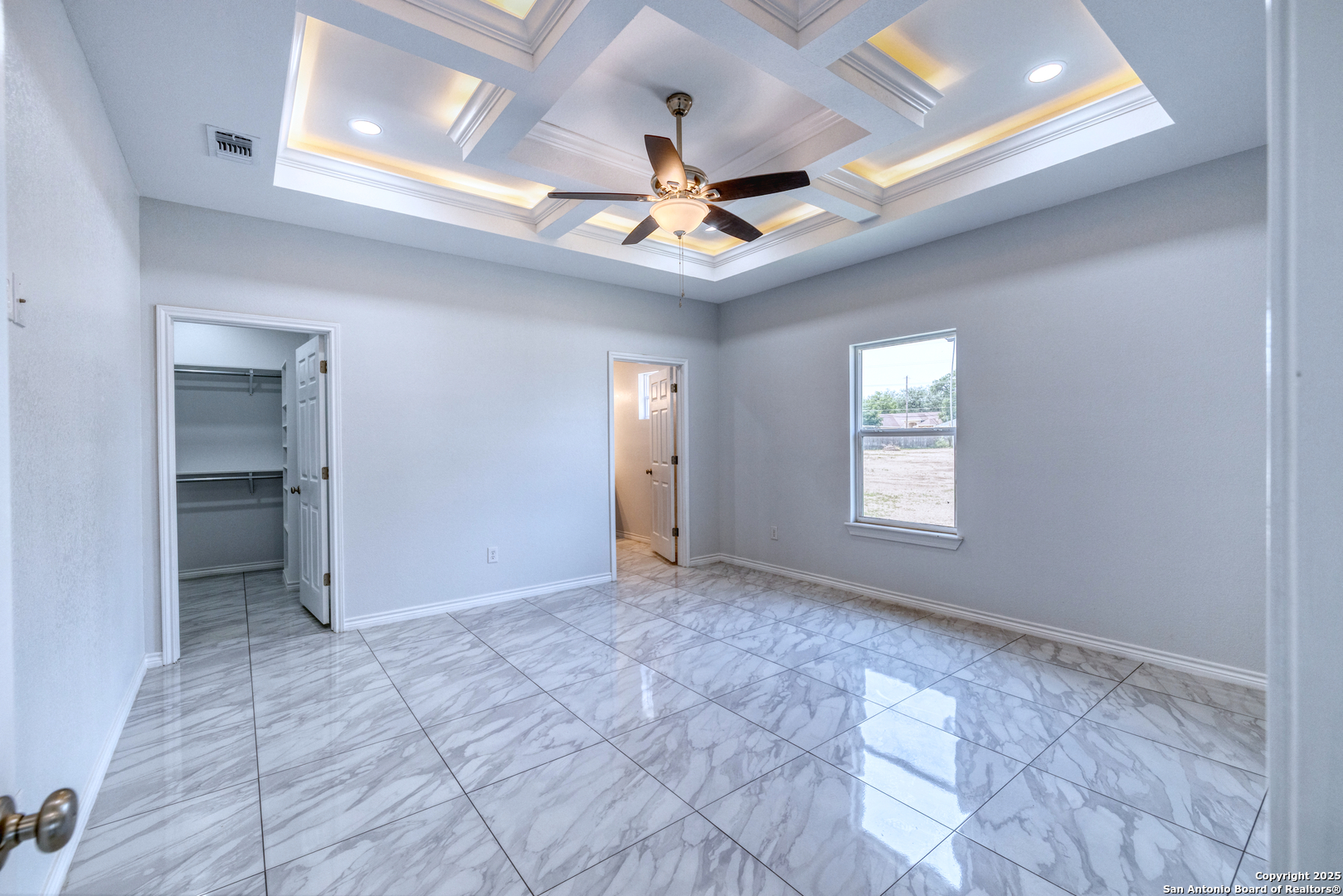 44 Sunday Court Uvalde, TX 78801 - Photo 17 of 30 an empty room with windows and fan