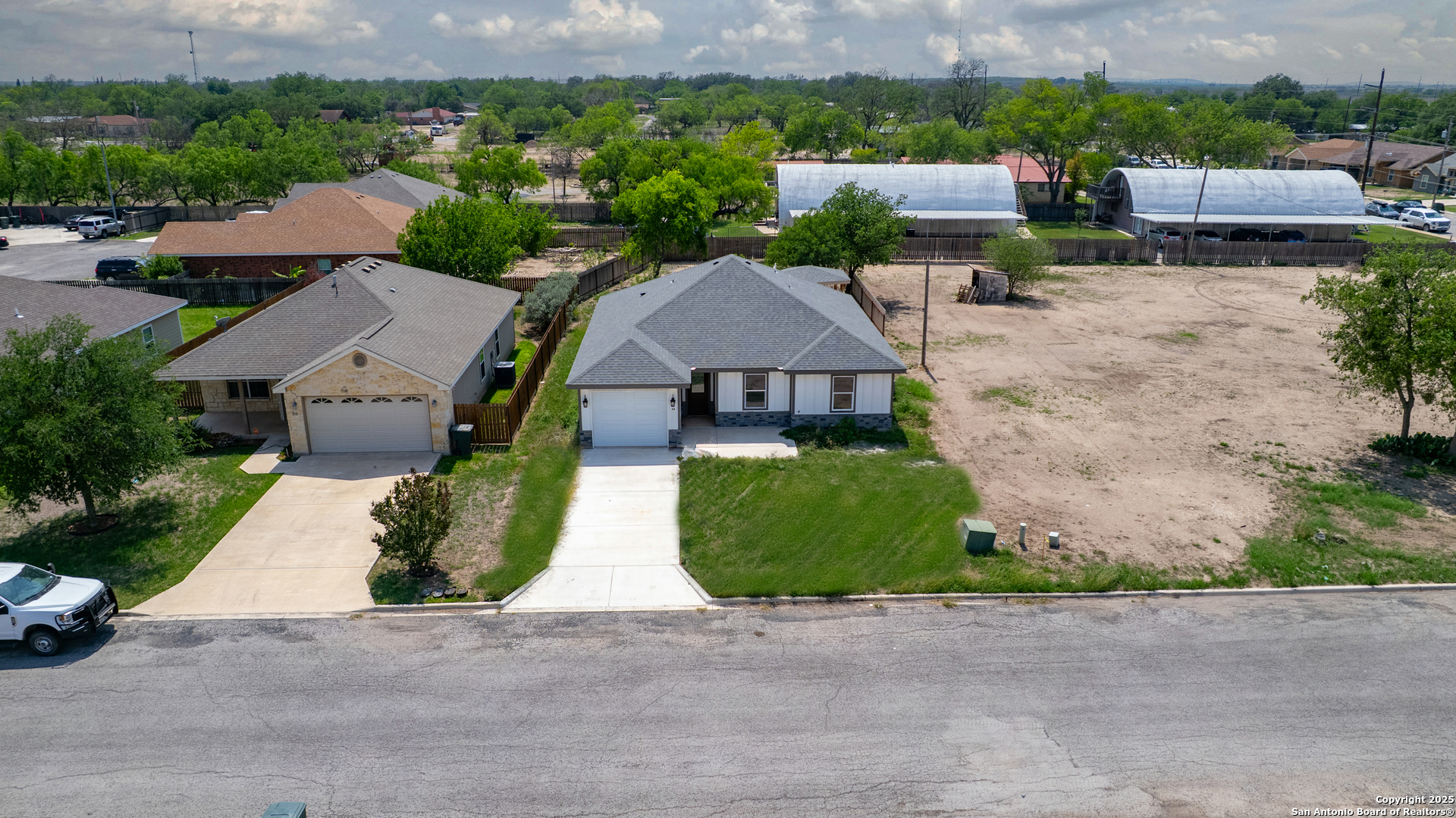 44 Sunday Court Uvalde, TX 78801 - Photo 28 of 30 an aerial view of a house with a garden and plants
