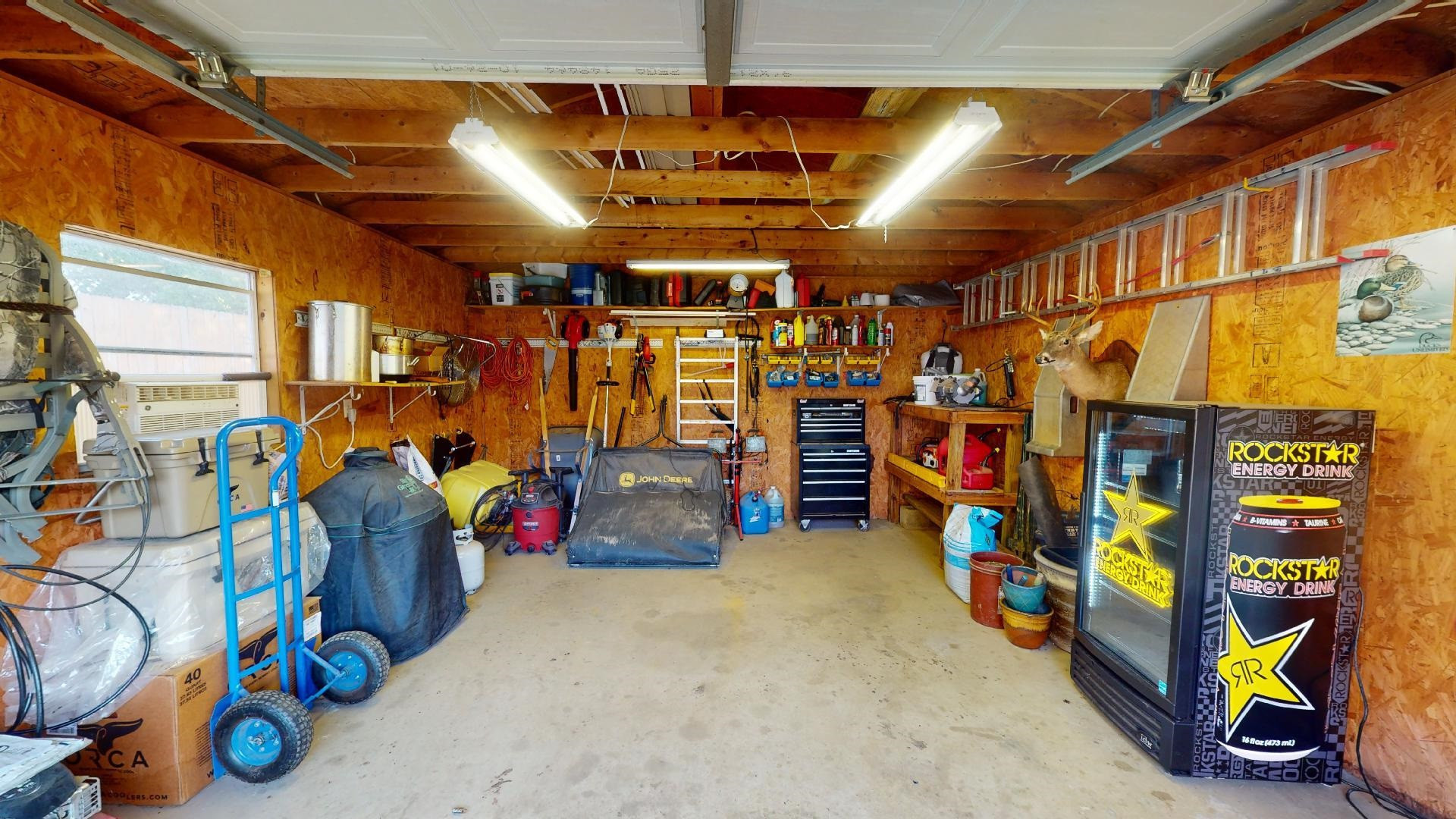 4395 Hamer Road Newbern, TN 38059 - Photo 17 of 20 a view of a storage room with a lot of stuff
