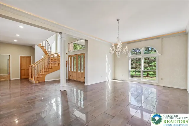 a view of kitchen and dining room with wooden floor