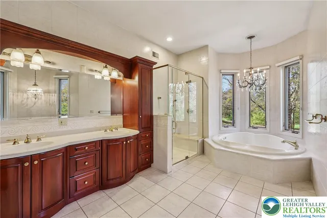 a bathroom with a toilet sink and shower