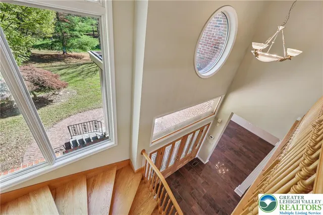 a view of gallery with wooden floor