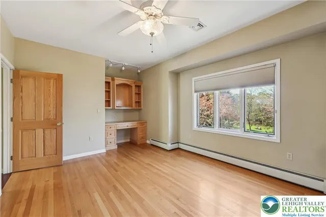 a bathroom with a sink vanity and a mirror
