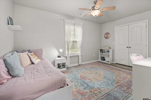 a house with swimming pool in front of it