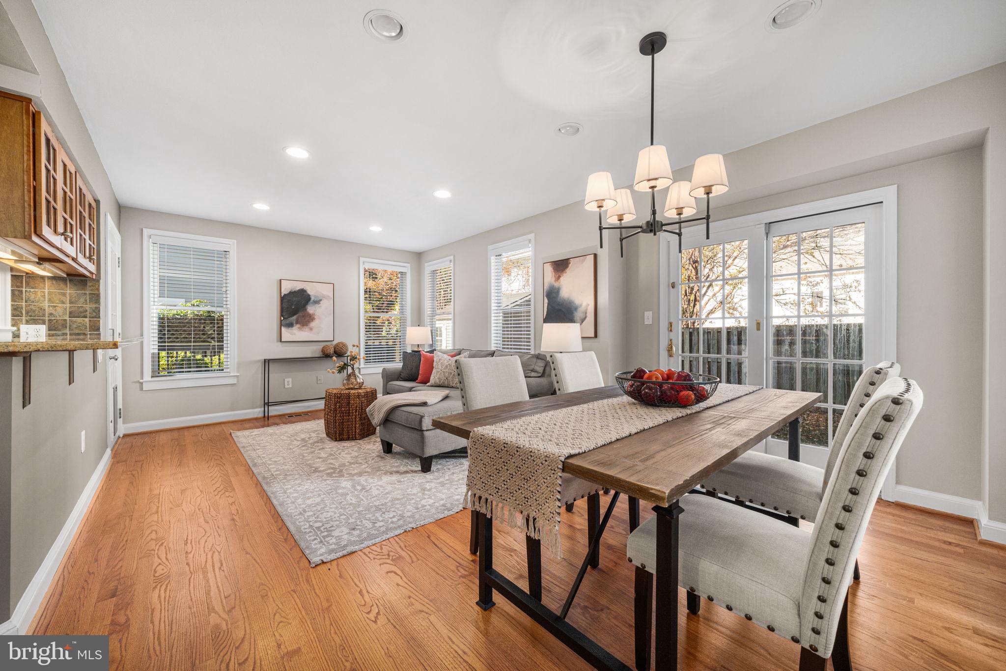 4613 8th Road South Arlington, VA 22204 - Photo 20 of 59 a view of a dining room with furniture window and wooden floor