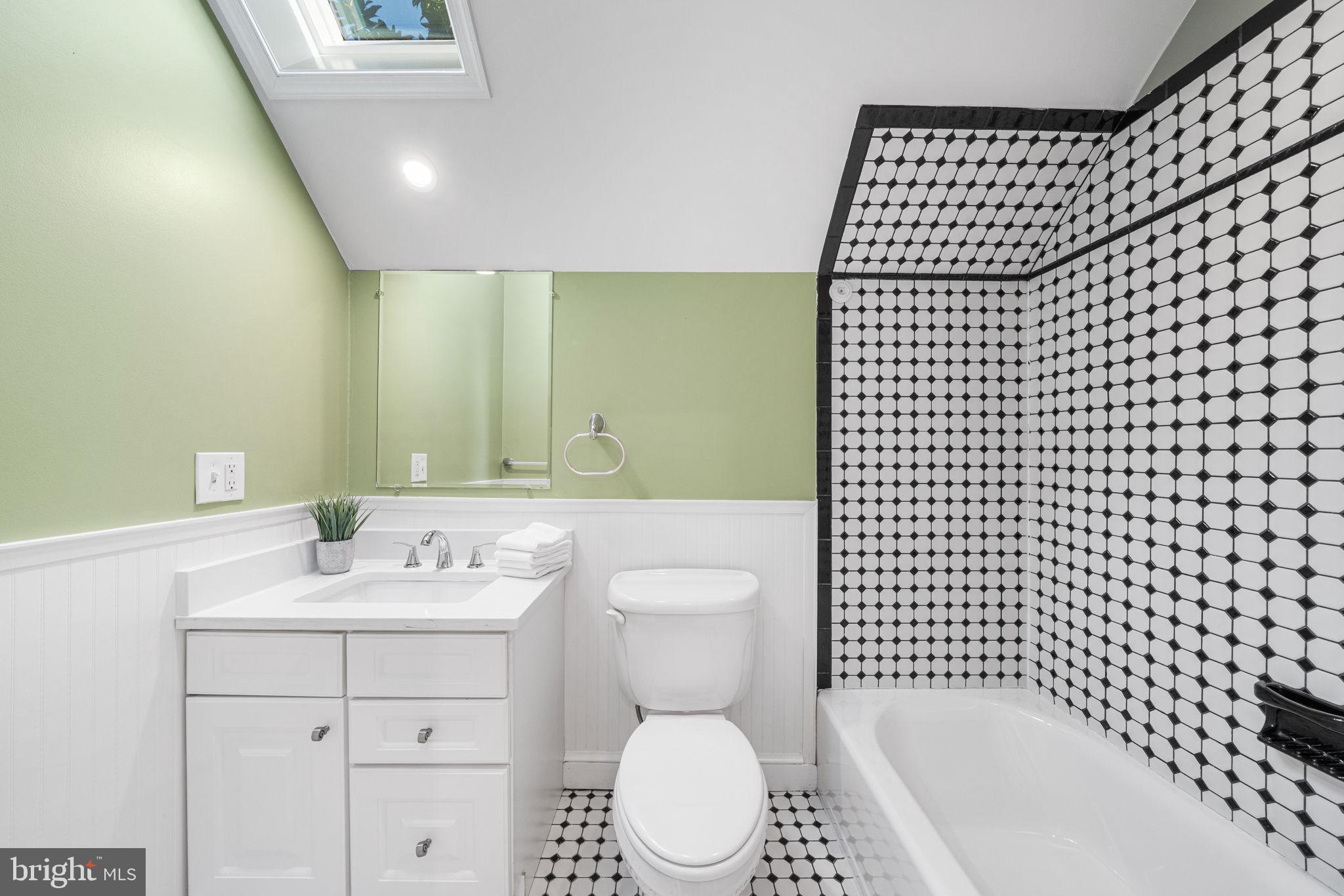4613 8th Road South Arlington, VA 22204 - Photo 34 of 59 a bathroom with a sink toilet and shower