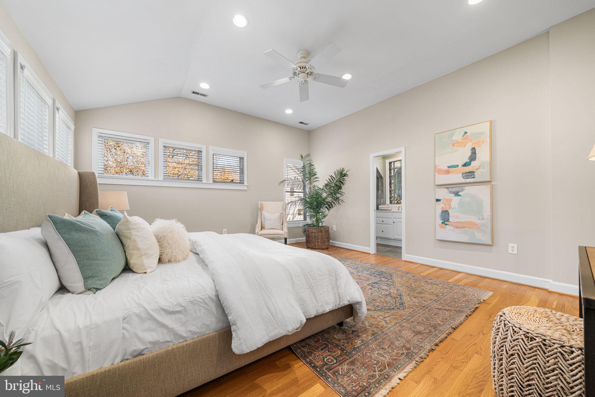 4613 8th Road South Arlington, VA 22204 - Photo 42 of 59 a bedroom with a large bed and a couch