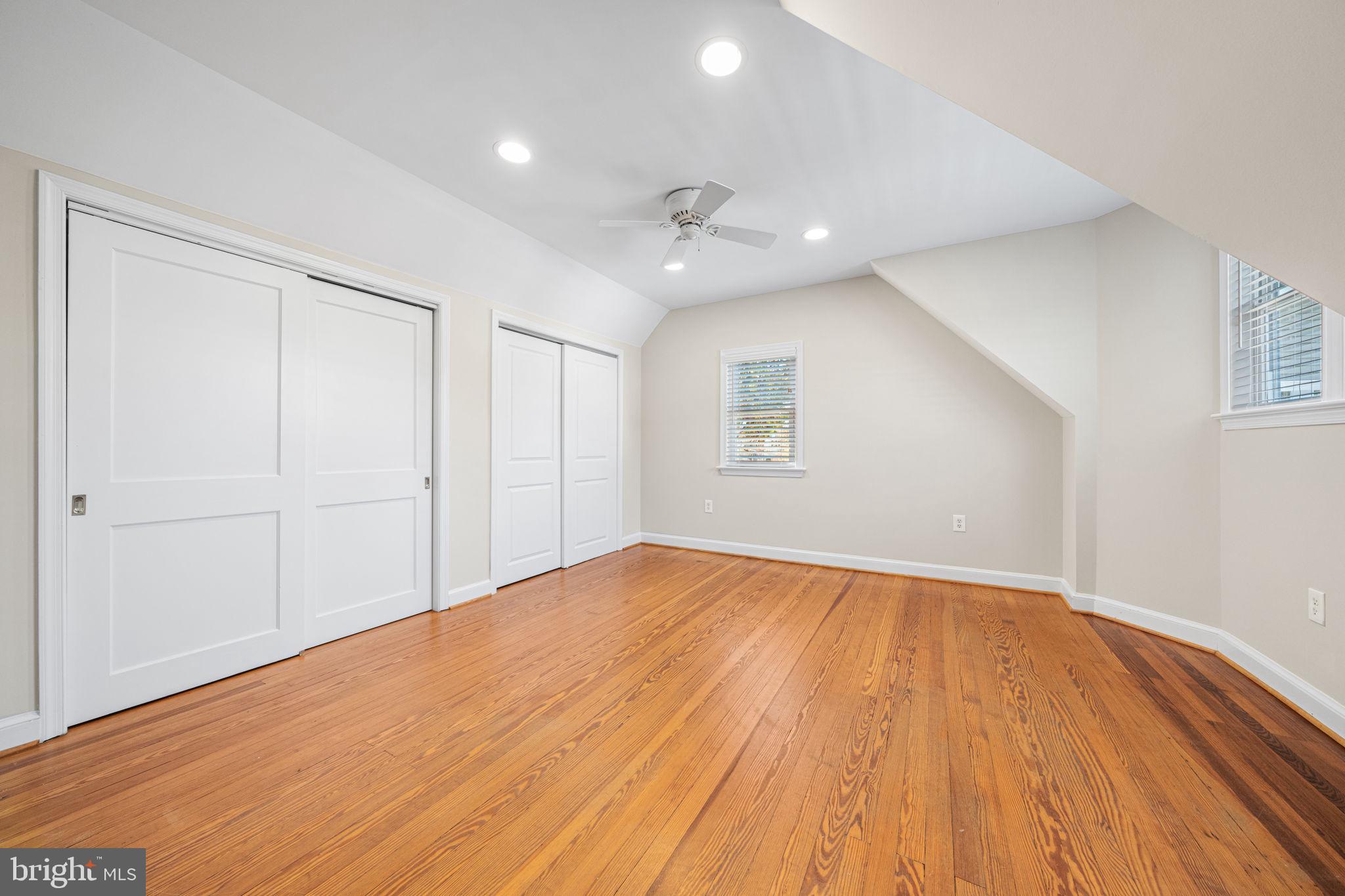 4613 8th Road South Arlington, VA 22204 - Photo 45 of 59 a view of an empty room with wooden floor and a window