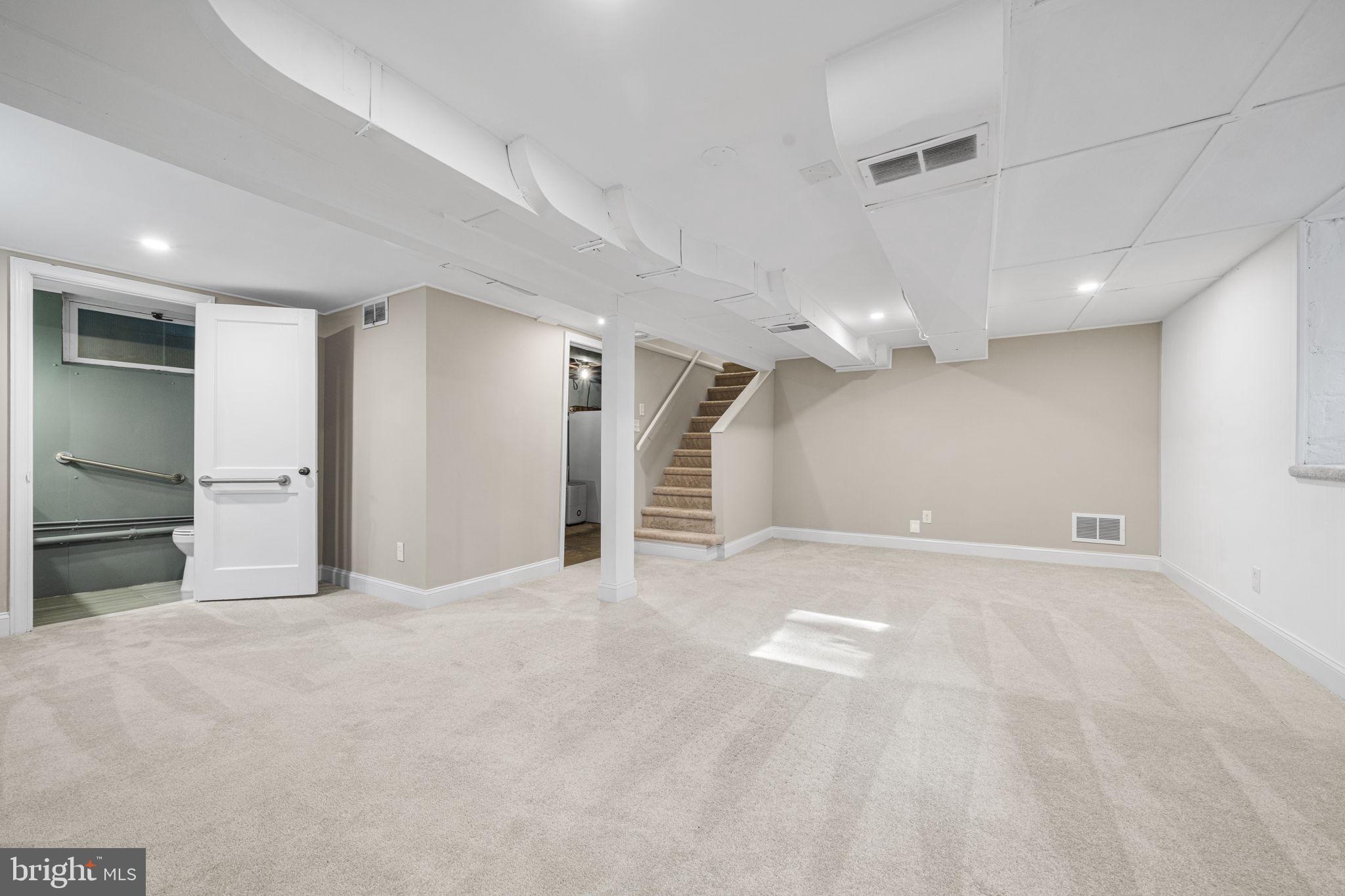 4613 8th Road South Arlington, VA 22204 - Photo 48 of 59 a view of an empty room with a kitchen