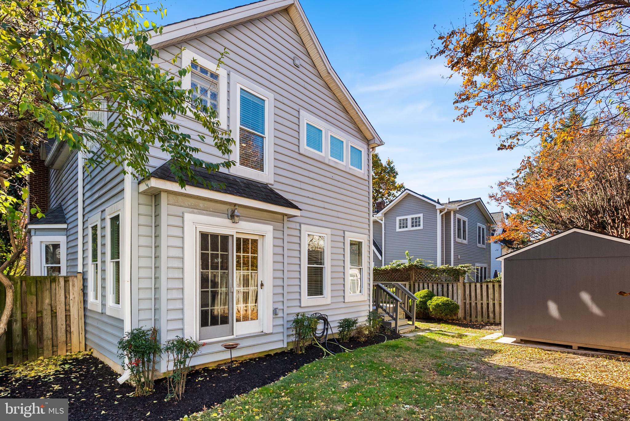4613 8th Road South Arlington, VA 22204 - Photo 55 of 59 a view of a house with a yard and potted plants