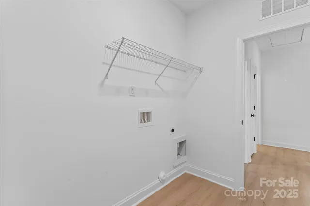 a view of a room with racks on the wall