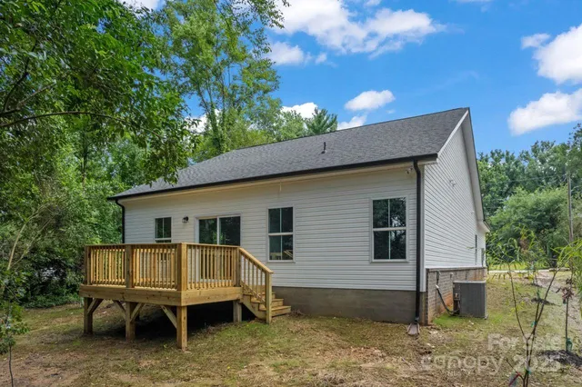 a view of balcony with wooden floor