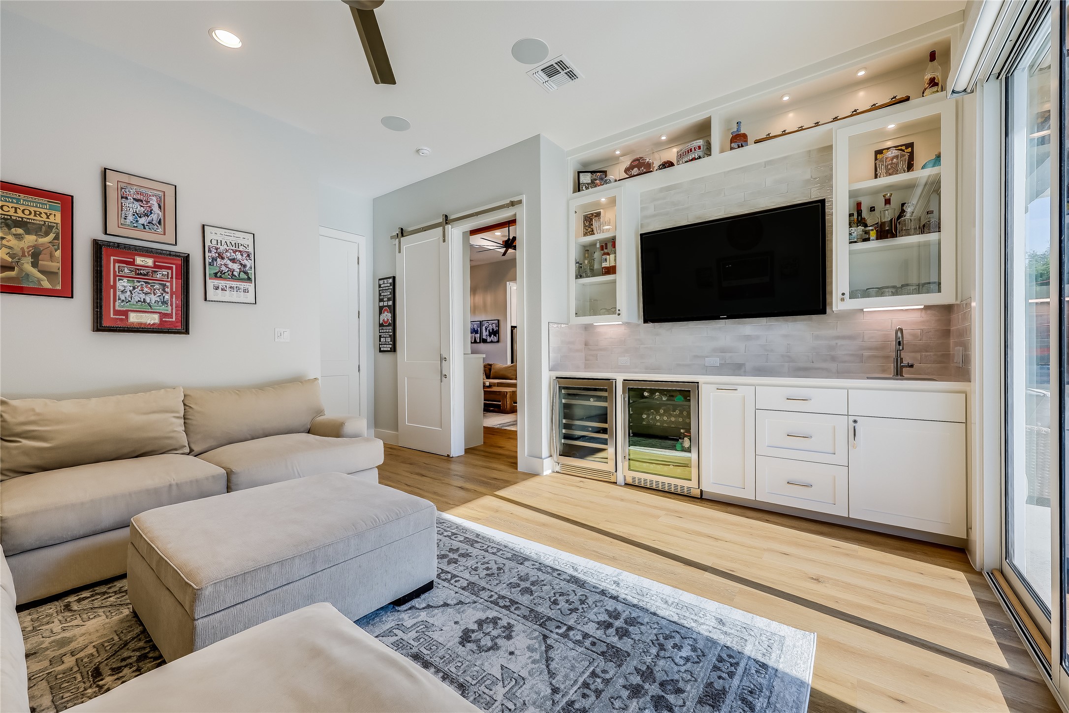 233 Lakefront Drive Lago Vista, TX 78645 - Photo 13 of 40 a living room with furniture and a flat screen tv