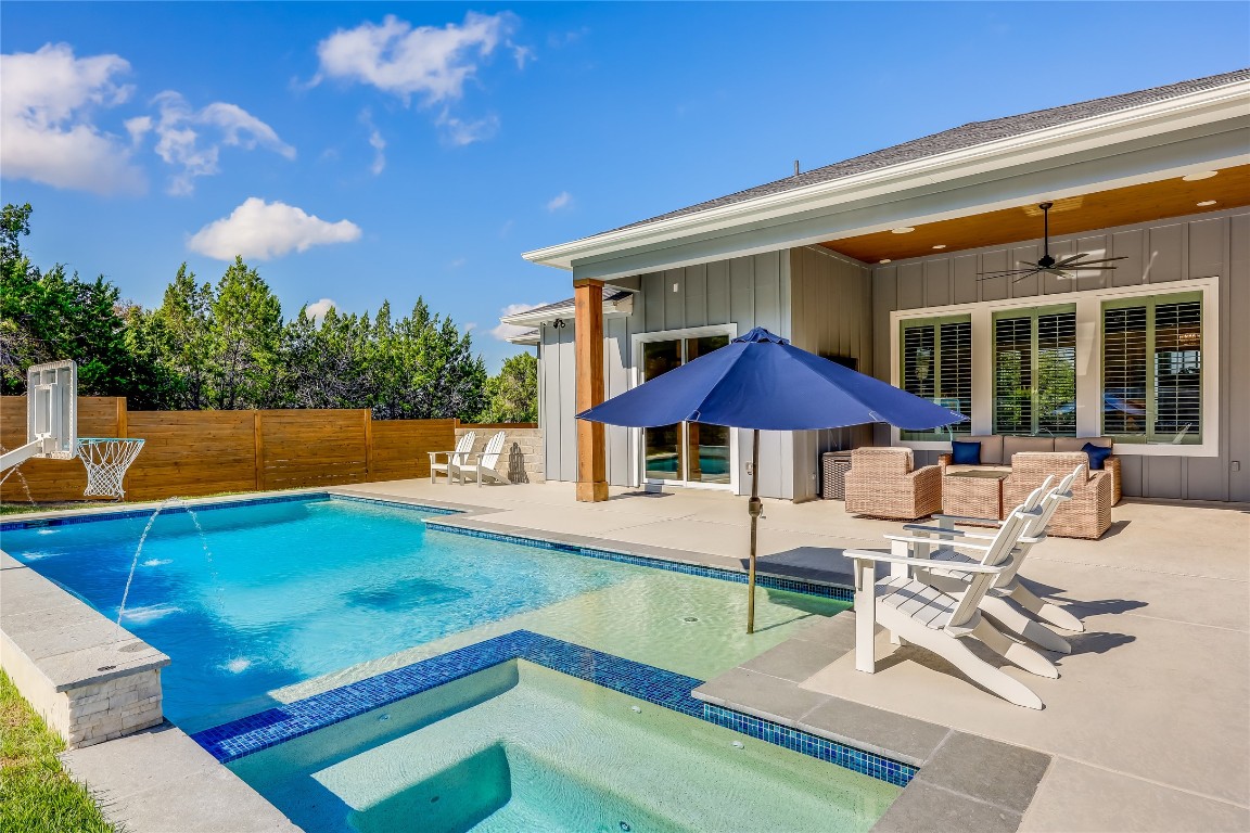 Undisclosed Address Point Venture, TX 78645 - Photo 14 of 40 a view of a house with swimming pool and sitting area