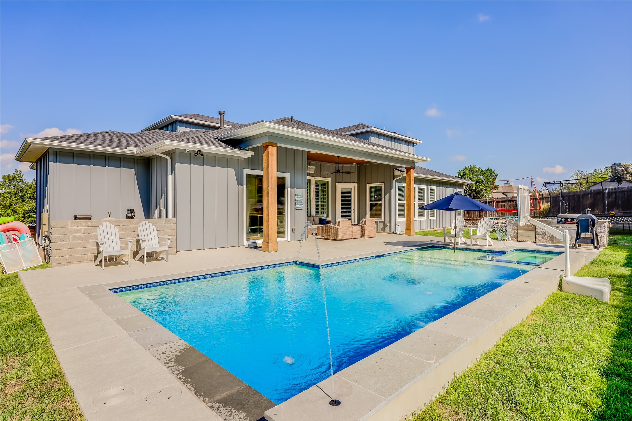 233 Lakefront Drive Lago Vista, TX 78645 - Photo 16 of 40 a view of a house with swimming pool