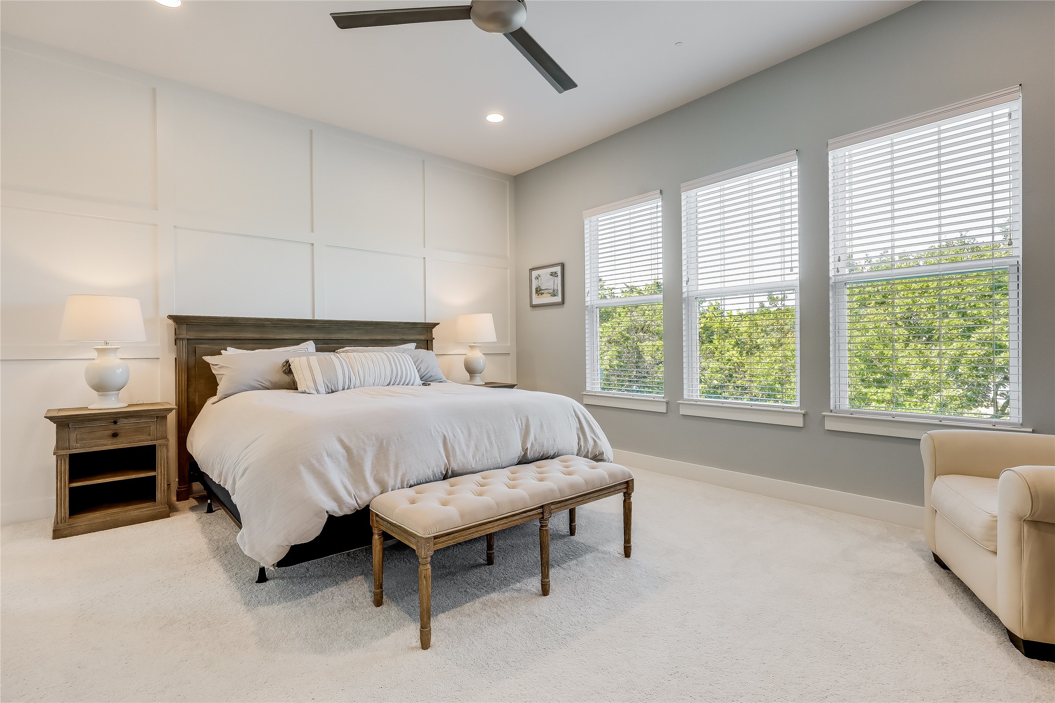 233 Lakefront Drive Lago Vista, TX 78645 - Photo 19 of 40 a bedroom with a bed and a large window