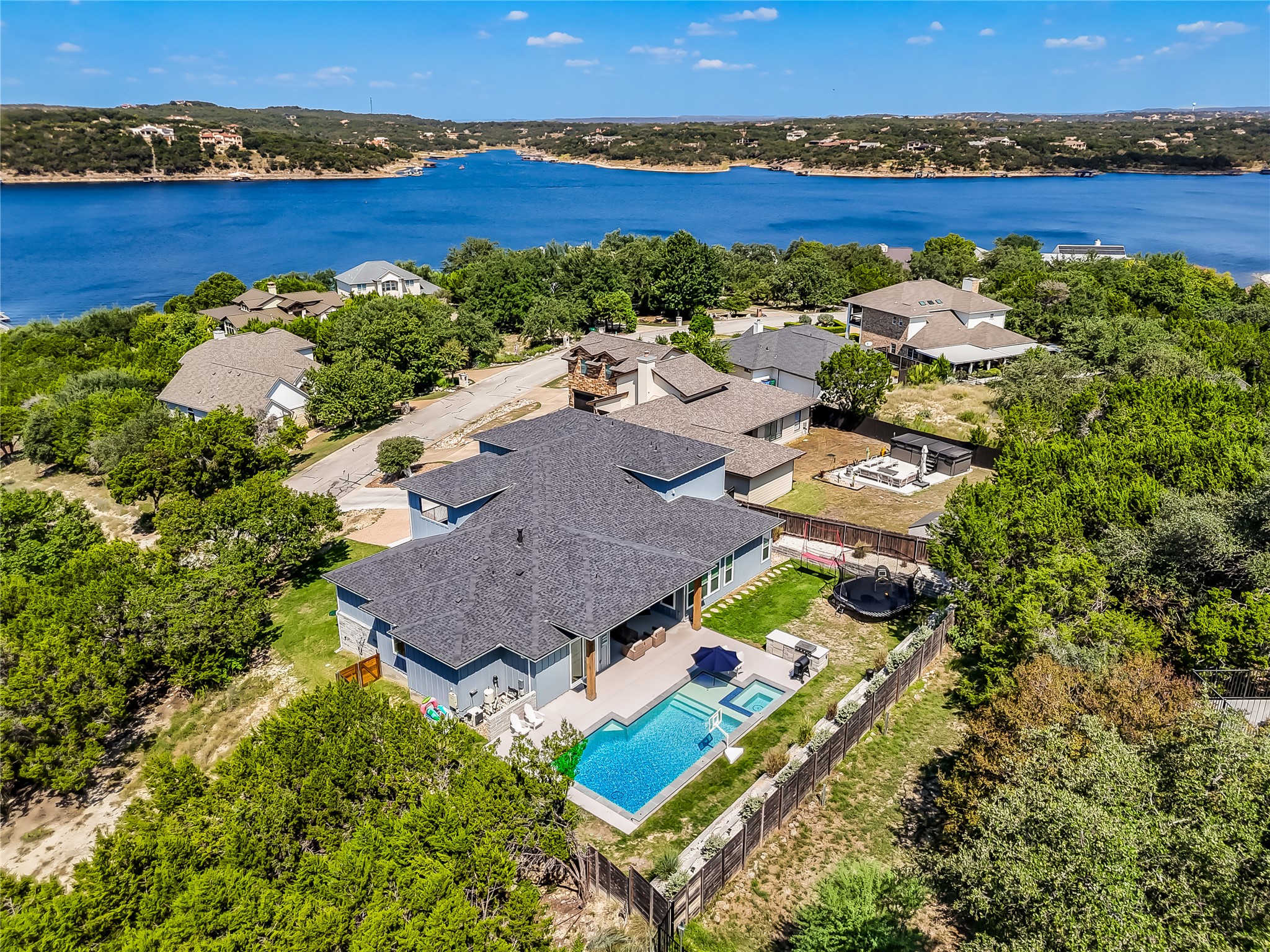 233 Lakefront Drive Lago Vista, TX 78645 - Photo 2 of 40 Gorgeous home with pool and sweeping views of Lake Travis.