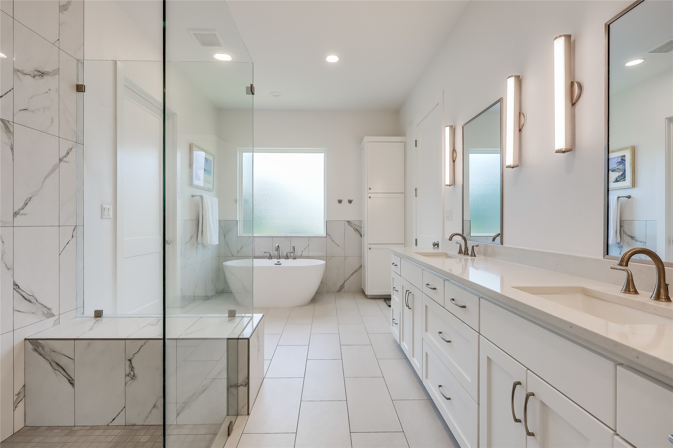 233 Lakefront Drive Lago Vista, TX 78645 - Photo 21 of 40 a spacious bathroom with a double vanity sink mirror and double