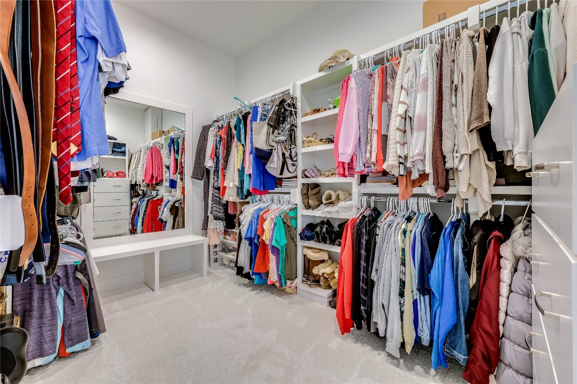 Undisclosed Address Point Venture, TX 78645 - Photo 21 of 40 a view of walk in closet with clothes
