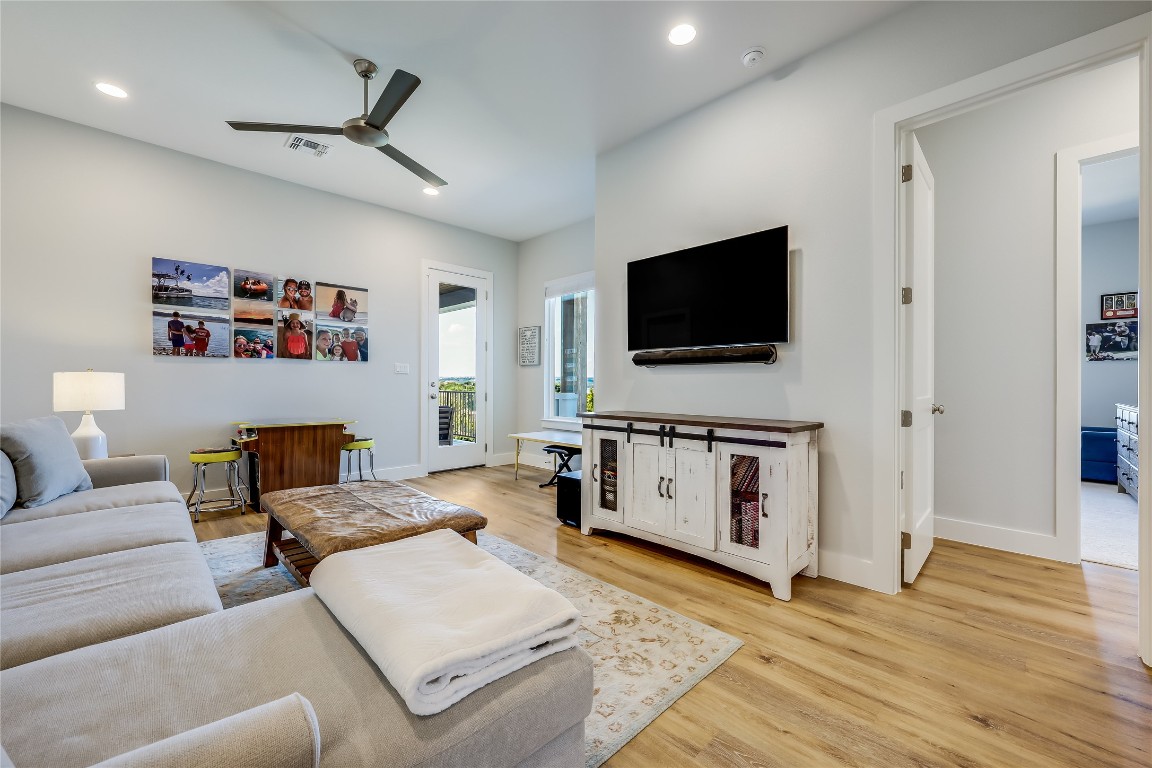 Undisclosed Address Point Venture, TX 78645 - Photo 25 of 40 a living room with furniture and a flat screen tv