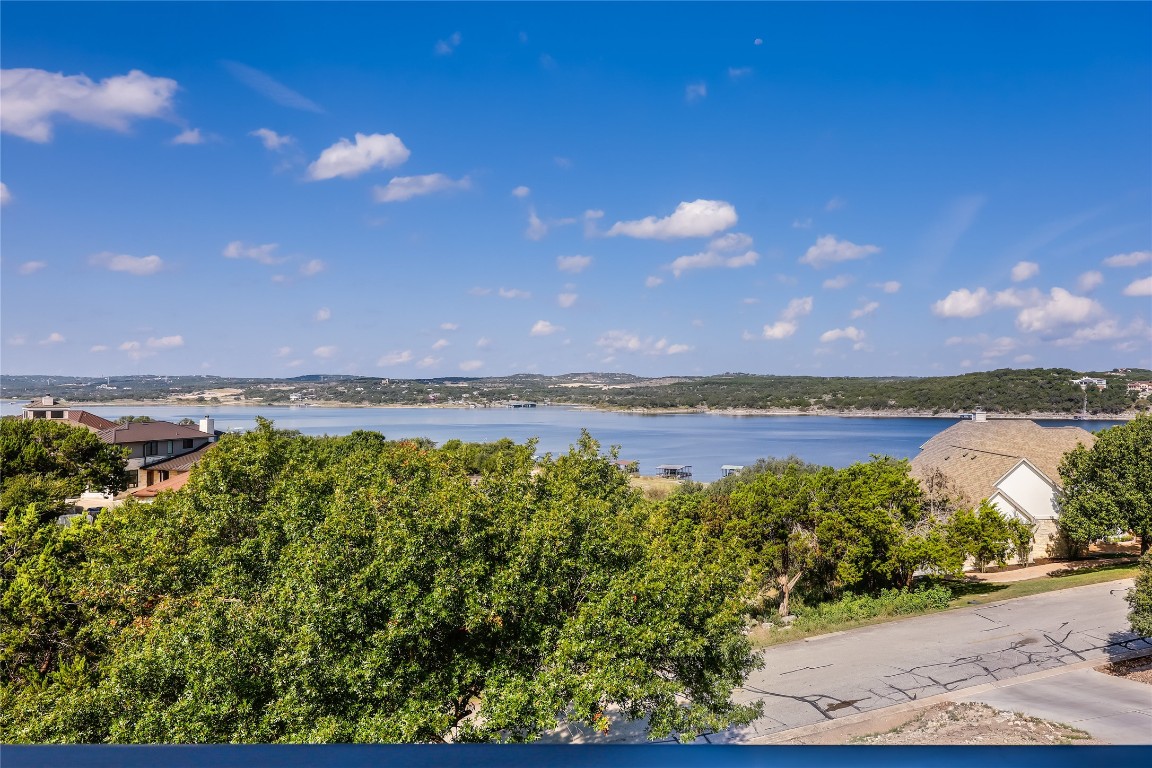 Undisclosed Address Point Venture, TX 78645 - Photo 29 of 40 a view of a lake with a city