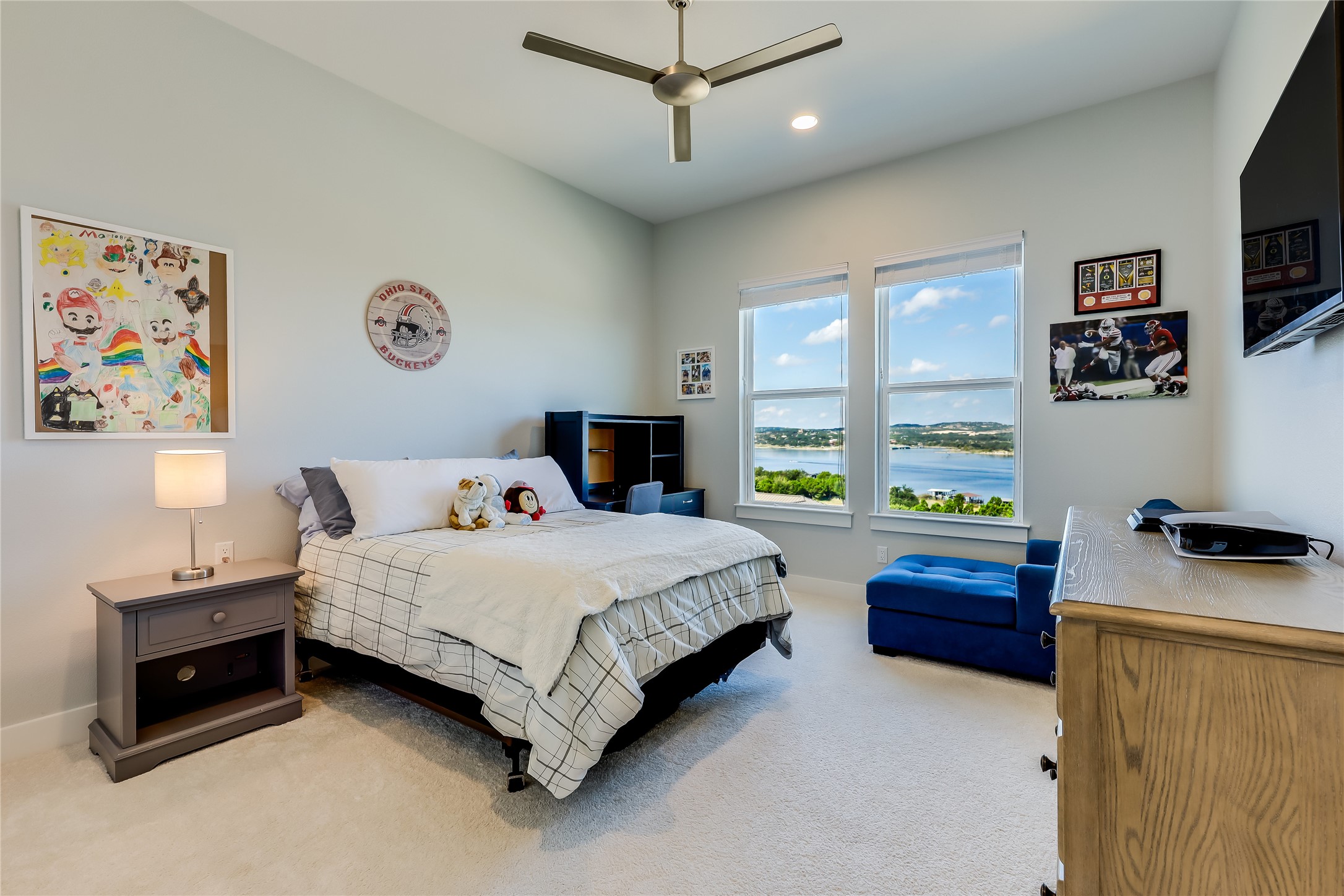 233 Lakefront Drive Lago Vista, TX 78645 - Photo 30 of 40 a bedroom with a bed dresser and a window