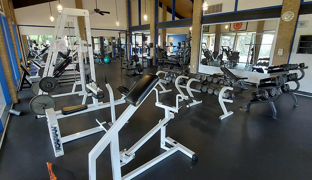 Undisclosed Address Point Venture, TX 78645 - Photo 37 of 40 a view of a room with gym equipment