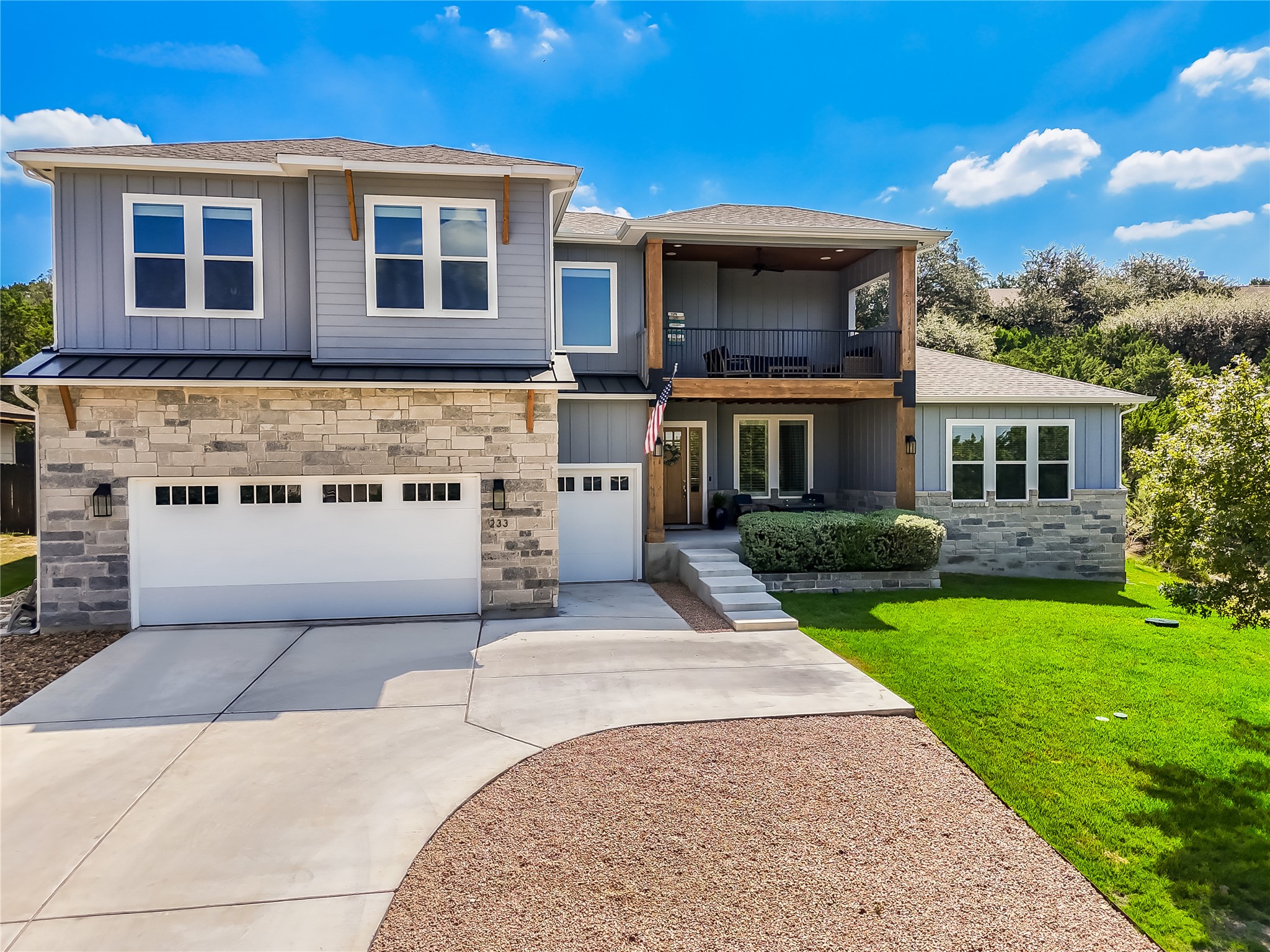 233 Lakefront Drive Lago Vista, TX 78645 - Photo 4 of 40 front view of a house with a yard