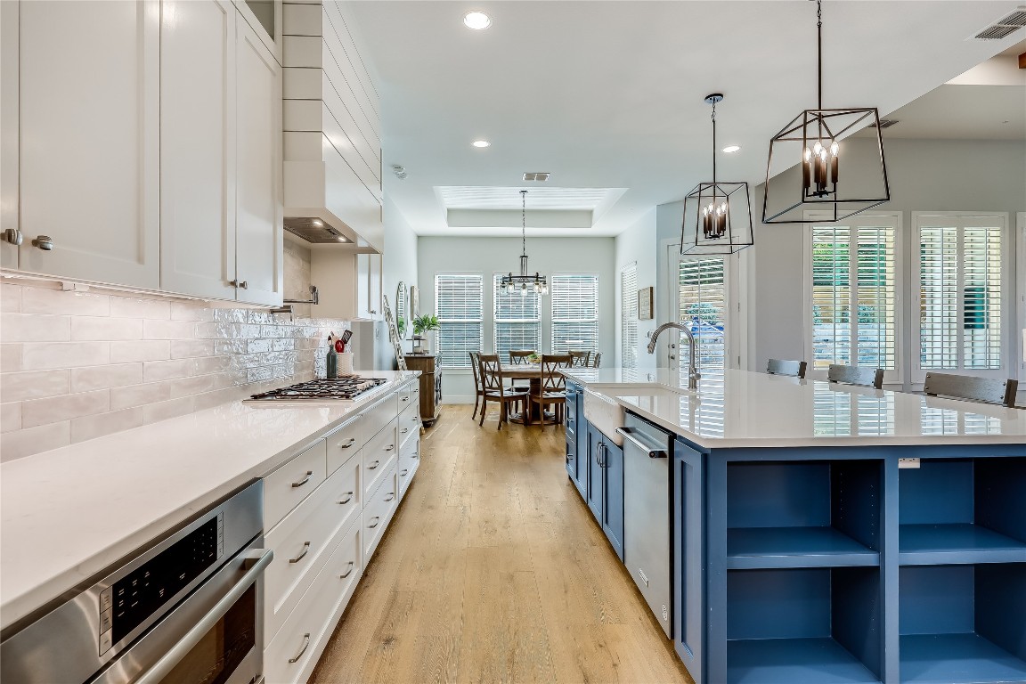 Undisclosed Address Point Venture, TX 78645 - Photo 7 of 40 a kitchen with counter top space a sink appliances and cabinets