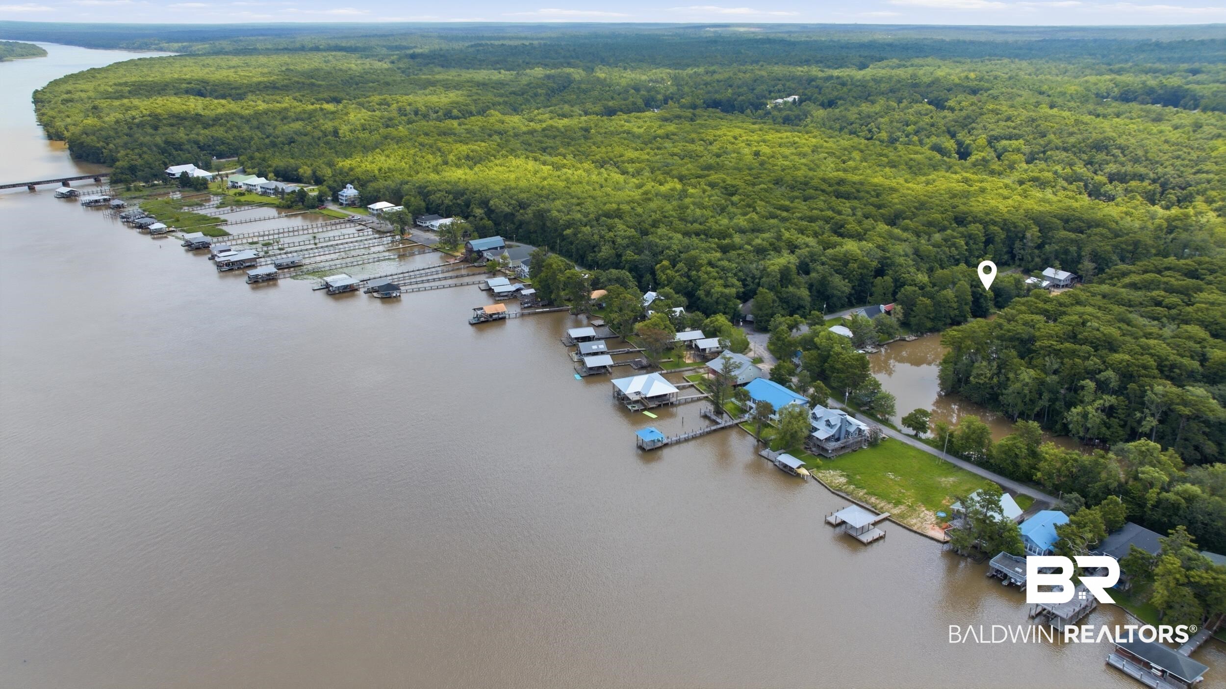 42080 Bayou Road Bay Minette, AL 36507 - Photo 37 of 43 Waterfront property featuring extensive shoreline frontage, multiple private docks, and direct access to a broad river