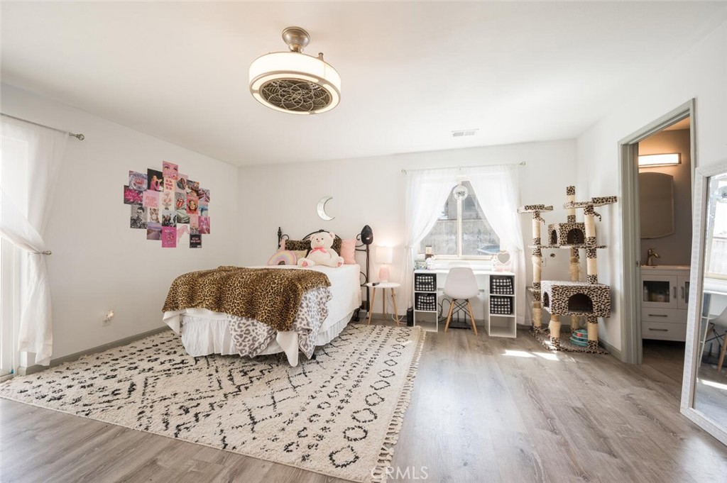 1503 17th Street Los Osos, CA 93402 - Photo 17 of 35 a living room with furniture and a table