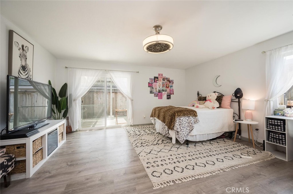 1503 17th Street Los Osos, CA 93402 - Photo 18 of 35 a living room with furniture and a flat screen tv