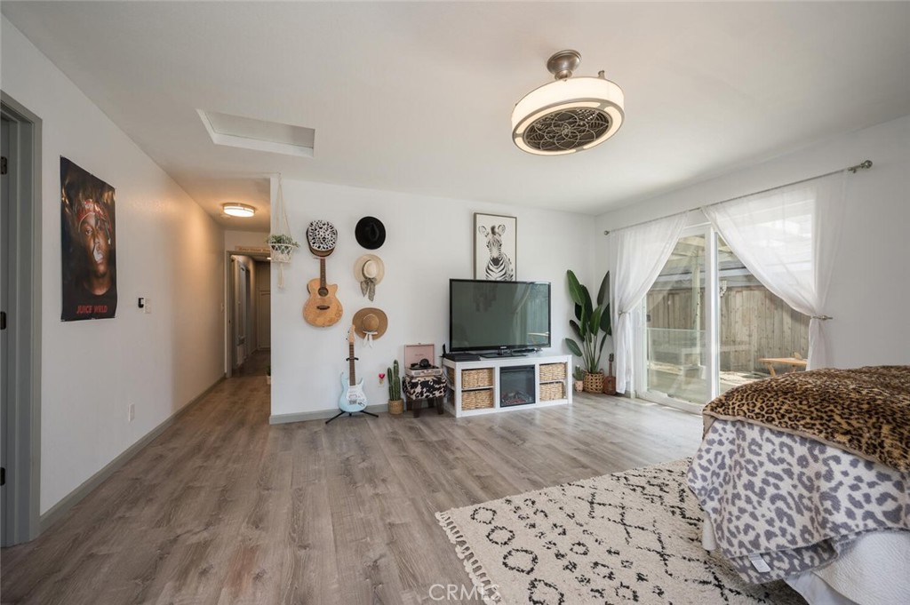 1503 17th Street Los Osos, CA 93402 - Photo 19 of 35 a living room with furniture and a flat screen tv